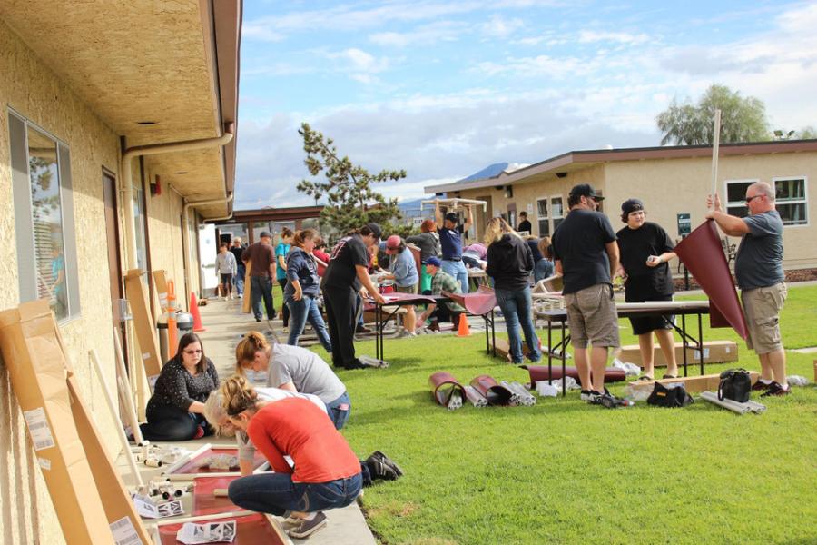 Volunteers assembling donated Kuranda dog beds.